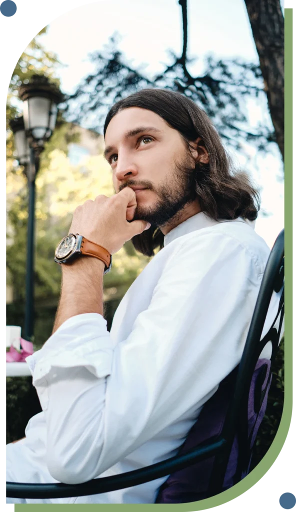 Adult man in thoughtful reflection representing personalized integrative psychiatric care at New Leaf Mental Health